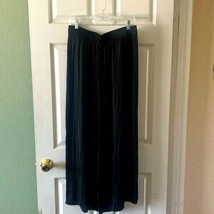 Black 100%rayon flows black pants. Rachel Zoe brand size Large. Elastic waist